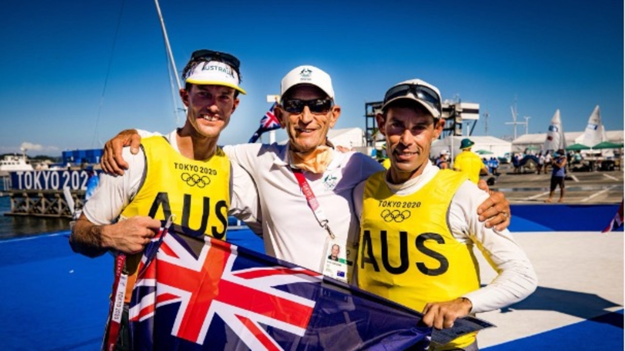 Zhik CEO Mat Belcher, right, after winning Gold at Tokyo Olympics with coach Victor Kovalenko, centre, and crew Will Ryan. Picture: Sailing Energy