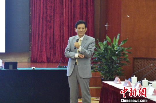 西班牙华侨王绍基：推动中国发展是华侨的使命