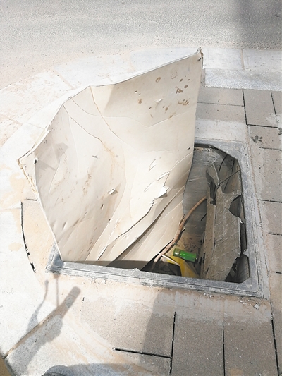 黄河大街南段 新修路面上窨井盖接连破损 有关部门：破损窨井盖已更换，将根据实际情况更改设计